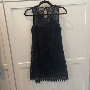 Little lacy and velvety embroidered black dress